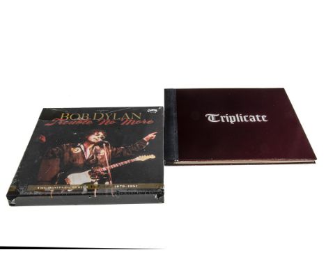 Bob Dylan Box Sets, two Bob Dylan Box Sets comprising Trouble No More (88985454661 - sealed) and Triplicate (889854135119 - E