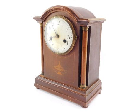 A late Victorian mahogany and inlaid mantel clock, circular enamel dial bearing Arabic numerals, German eight day movement, w