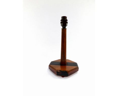 An Art Deco style wooden table lamp, in two tone design, 30cm high.
