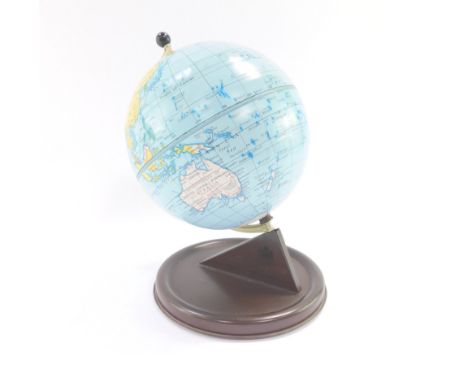 A Chad Valley mid century tin plate terrestrial globe, raised on a brown base, 27cm high.