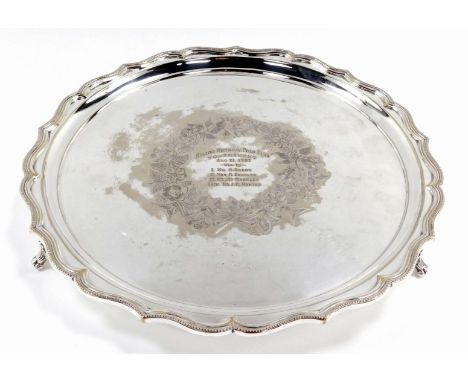 A Curtis and Ingersol of Leicester silver plated presentation salver, with a flared rim detailing and etched floral centre be