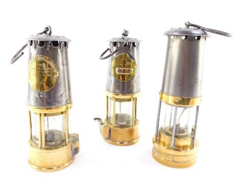 A Ministry of Power miner's safety lamp, type SL, by The Protector Lamp &amp; Lighting Company Ltd, No 200., together with tw