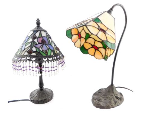 A Tiffany style desk lamp, with a pentagonal floral shade, 42cm high, and a Tiffany style table lamp, decorated to the shade 