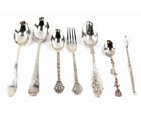 A group of silver and plated flatware, comprising a silver Fiddle pattern spoon with hammered floral detailing, London 1917, 