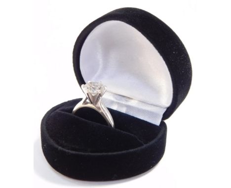 A diamond solitaire ring, high claw set in white metal, stamped 14k, approximately 2cts, size J/K, 4.4g. On initial inspectio