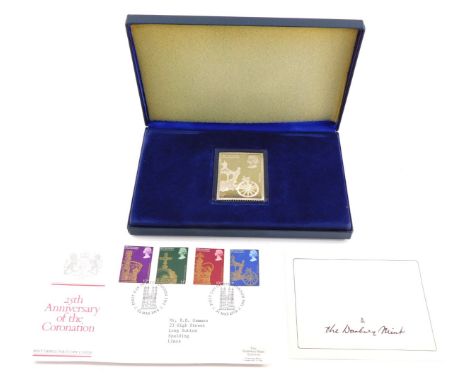 A Danbury Mint 25th Anniversary of The Coronation silver collectors stamp, with first day cover envelope and care instruction