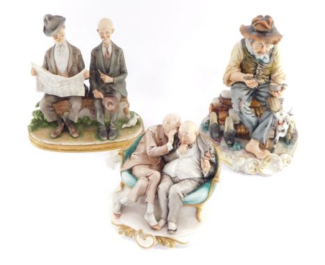 Three Capo di Monte figure groups, comprising a gentleman with a spaniel, two men seated on a sofa, and a group of old men wi