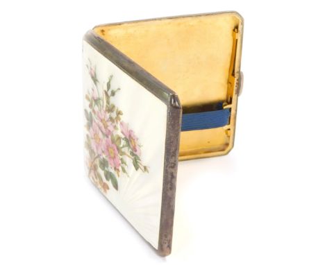 A George VI silver and enamel cigarette case, the front panel with white enamel detailing and overpainted pink flowers, beari