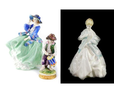 A Volkstedt porcelain figure modeled as an urchin drummer boy, V20774, impressed and printed marks, 14cm high, together with 