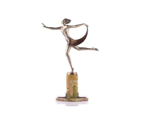 After Josef Lorenzl (1892-1950), an Art Deco cast metal figure of a partially clothed female dancer, on a shaped onyx base, 2