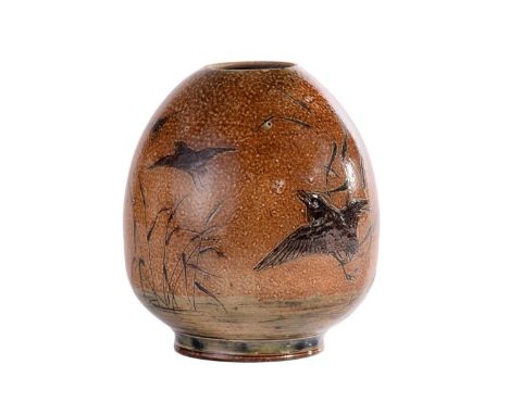 A late 19th century Martin Brothers stoneware ovoid vase, by Robert Wallace Martin, with incised decoration of a wading bird 