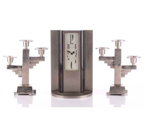 L' Emeraude of Lausanne, an Art Deco chromium-plated and black marble mantle timepiece with an elongated dial marked in styli