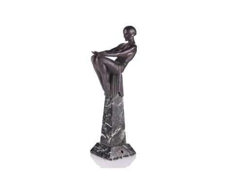 After Max Le Verrier, an Art Deco silvered and patinated figural table lamp in the form of a 1930s naked lady of fashion seat