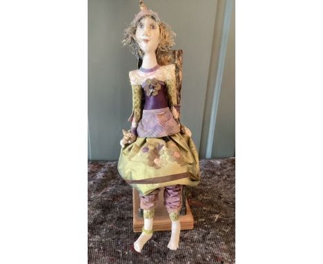 Artist Cloth 16’ Painted stockinette dressed doll on chair-artist vintage made piece., dressed in gown, hat and shoes.(1)
