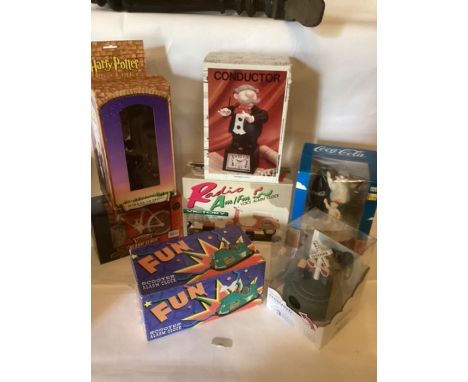 Novelty alarm and other clocks; includes Harry Potter mirror of frised clock,bumper cars fairground clock, coco coca clock an