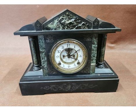 A Victorian slate mantel clock with green Italian marble columns either side and green marble panels. Made by Ansonia &amp; C