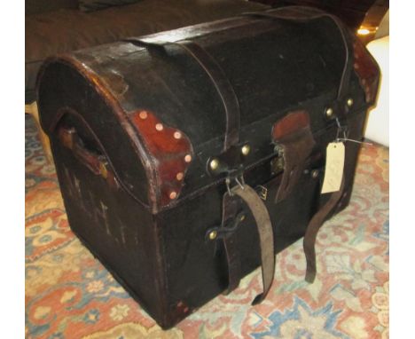 TRAVELLING TRUNK, 19th century canvas and leather bound with rising lid and straps, original red lined interior with tray by 
