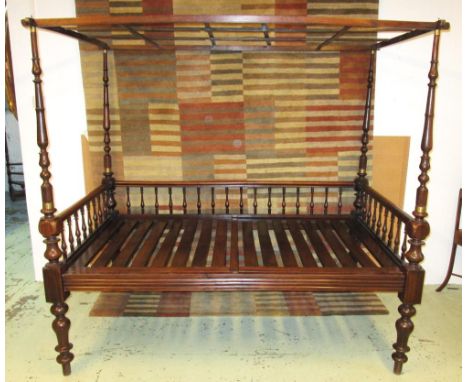 TESTER DAY BED, late 19th/early 20th century Anglo Indian rosewood with brass collared turned posts, three-quarter spindle si