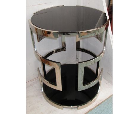 SIDE TABLES, a pair, circular with black glass top and under shelf on a chromed metal frame, 56cm diam x 68cm H. (2)