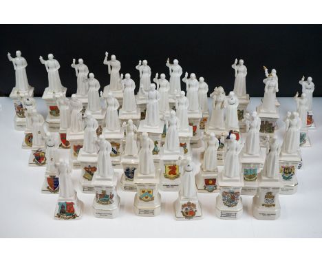 40 ceramic crested ware / goss figurines of Florence Nightingale, each with a town crest to the front. Tallest measures 19cm 