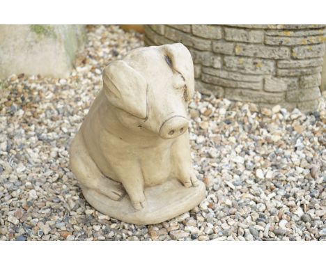 Reconstituted Stone Garden Model of a Seated Pig, 40cm high 