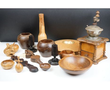 A small group of wooden collectables to include loving spoons, carved ornaments, bowls, coffee grinder...etc. 