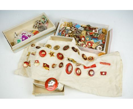 A collection of vintage Russian pin badges. 