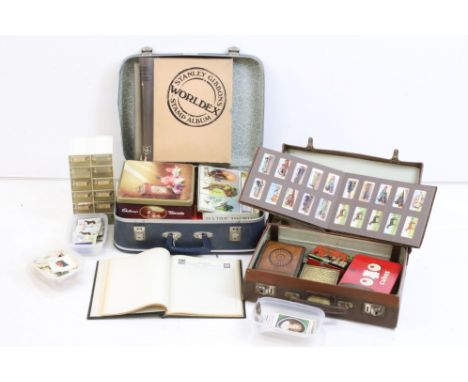 Assortment of 20th Century used world stamps, vintage advertising tins and cigarette cards to include silk cards (mostly flag