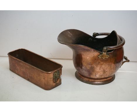 Copper Planter with Brass lion handles together with a copper coal scuttle. 