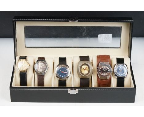 Watch display case containing six vintage gents watches 