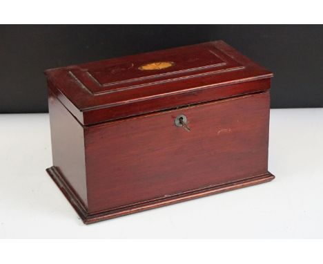 Tea caddy having a hinged lid with inlaid walnut panel opening to reveal tea bowl to the centre flanked by two walnut marquet