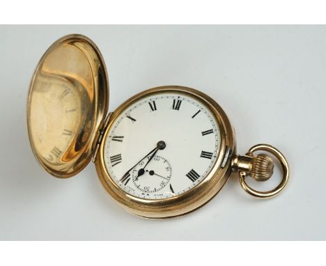 A 10ct gold plated full hunter pocket watch with white enamel dial and sub second dial to 6 o'clock. 