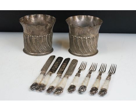 A pair of fully hallmarked sterling vases together with a silver plated knife and fork set with mother of pearl handles. 