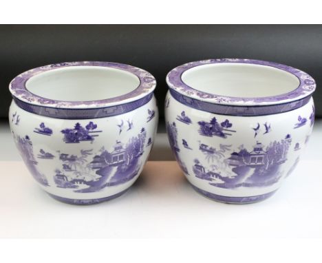 Pair of 20th Century Chinese planter pots. Each having purple printed landscape scenes to the sides and geometric borders. Ma