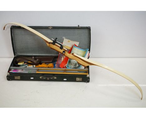 An archers bow and arrow set together with assorted accessories. 