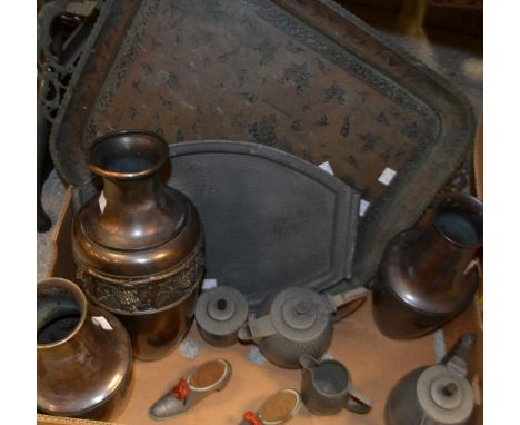 A four piece Malayan FMS pewter tea service on tray; a pair of base metal novelty shoe pin cushions; a garniture of three met