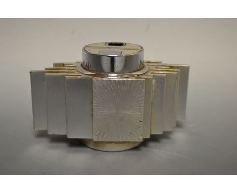 A sculptural Art Deco table lighter.