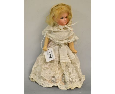 A German bisque headed doll marked 390 8/0