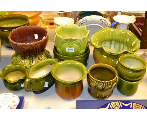 A Bretby jardiniere, moulded in the Aesthetic Movement with stiff bull rushes, registration 215983, shape 909H, impressed mar