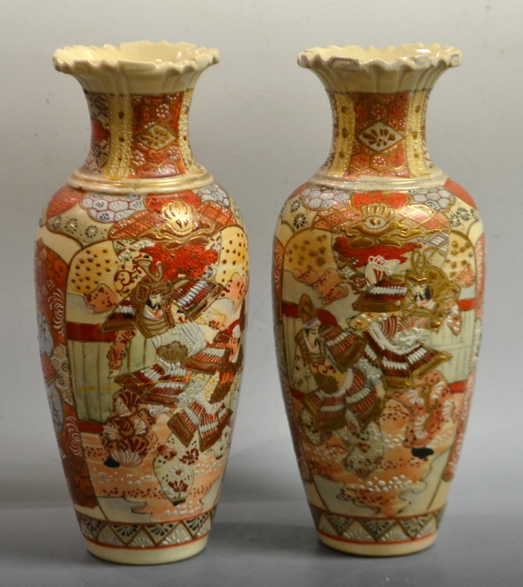 A Pair Oif Japanese Satsuma Pottery Vases Painted With Samuri