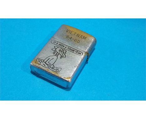 A Zippo lighter, engraved Vietnam 64 - 65