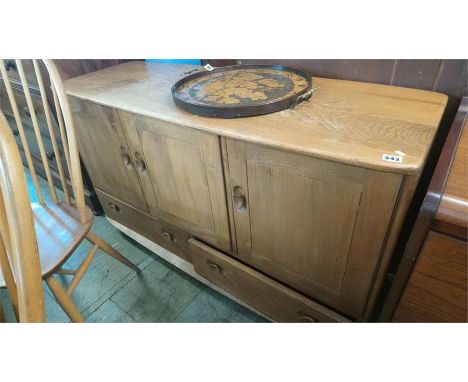 An Ercol Golden Dawn sideboard