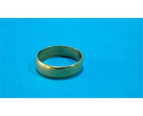 A gold coloured Gents ring (marks rubbed). 8.9 grm