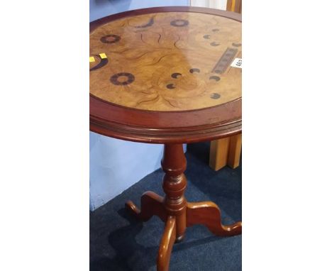 A 19th century mahogany tripod table with a marquetry inlaid circular top, 50cm diameter