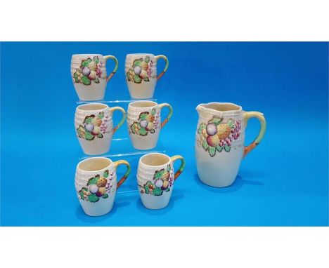 An A.J. Wilkinson seven piece drinks set