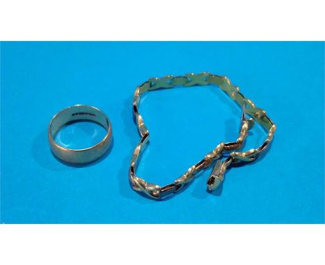 A 9ct gold ring and a bracelet stamped 9kt. 12.2grm