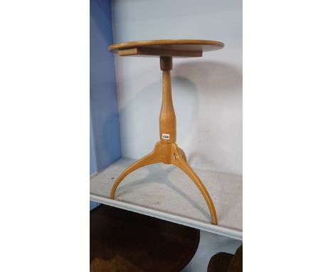 A pale oak tripod table, signed with a painted bee