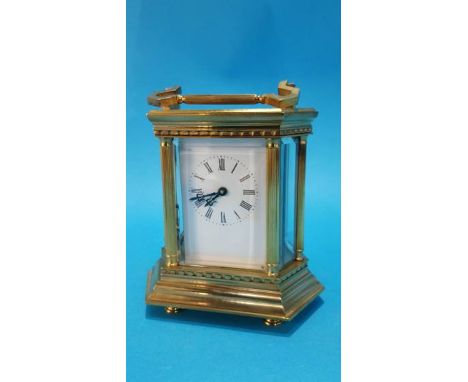An octagonal cased carriage clock, stamped Made In France