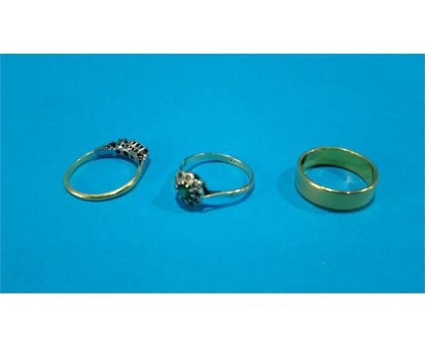 Ring stamped 18ct and two other gold coloured rings. 11.3grm