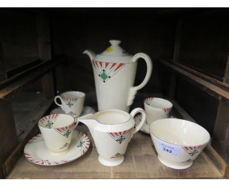 A Newhall Staffordshire Art Deco style coffee service, with three cups and saucers